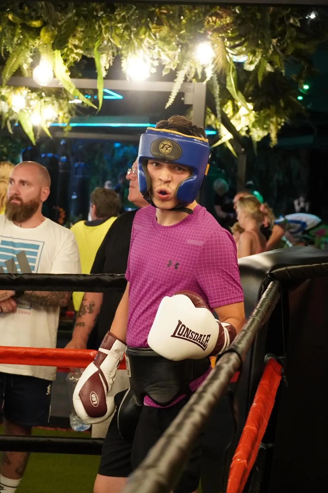 Boxer at the ropes waiting for their round