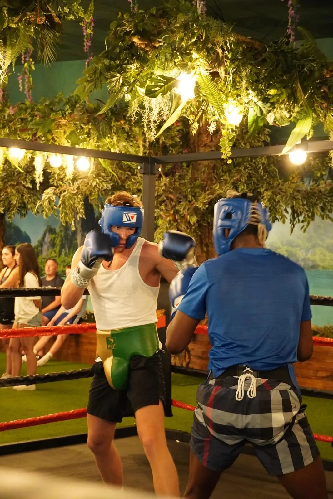 Sparring exchange in the ring